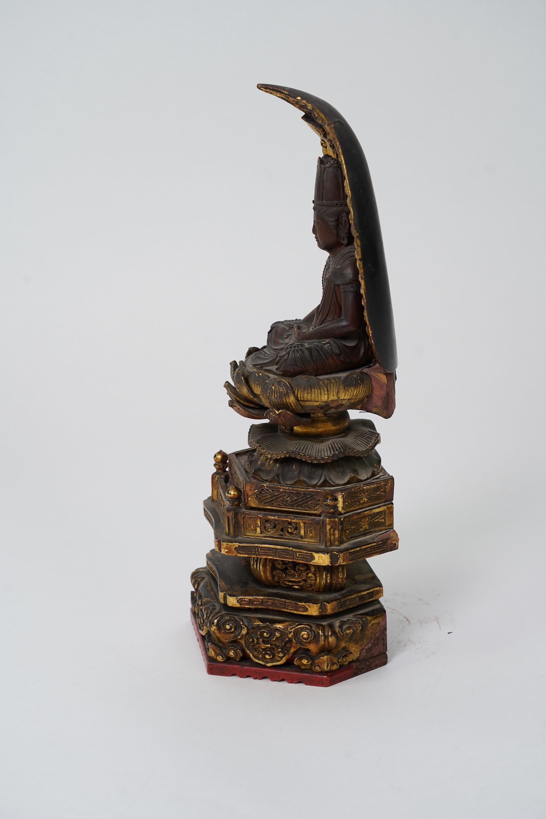 A Japanese Buddhist boxwood and giltwood seated figure of Dainichi Nyorai, 19th century